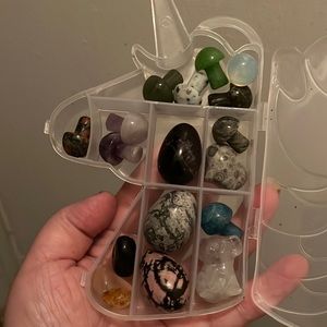 multiple shapes of stones cones with unicorn holder